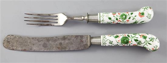 A Danish porcelain handled knife and fork, late 18th century, 21cm and 25cm